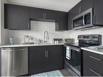 Espresso Kitchen Cabinets at One East Delaware, Chicago